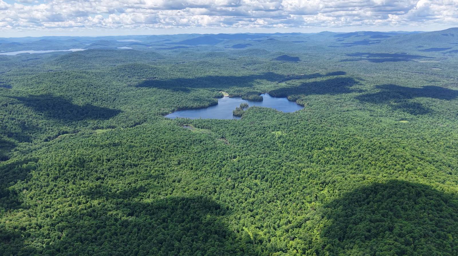 Forested ridges and islands around the lake